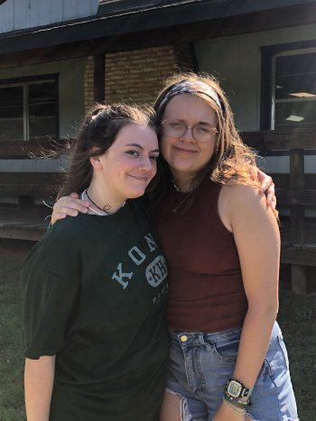 Two Girls Hugging at camp